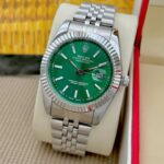 RolexDatejustSilverGreenMetalWatch1080X1080_1.jpg